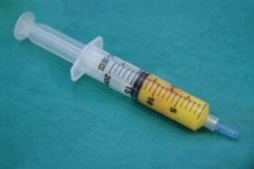 syringe with adipose tissue for penis enlargement